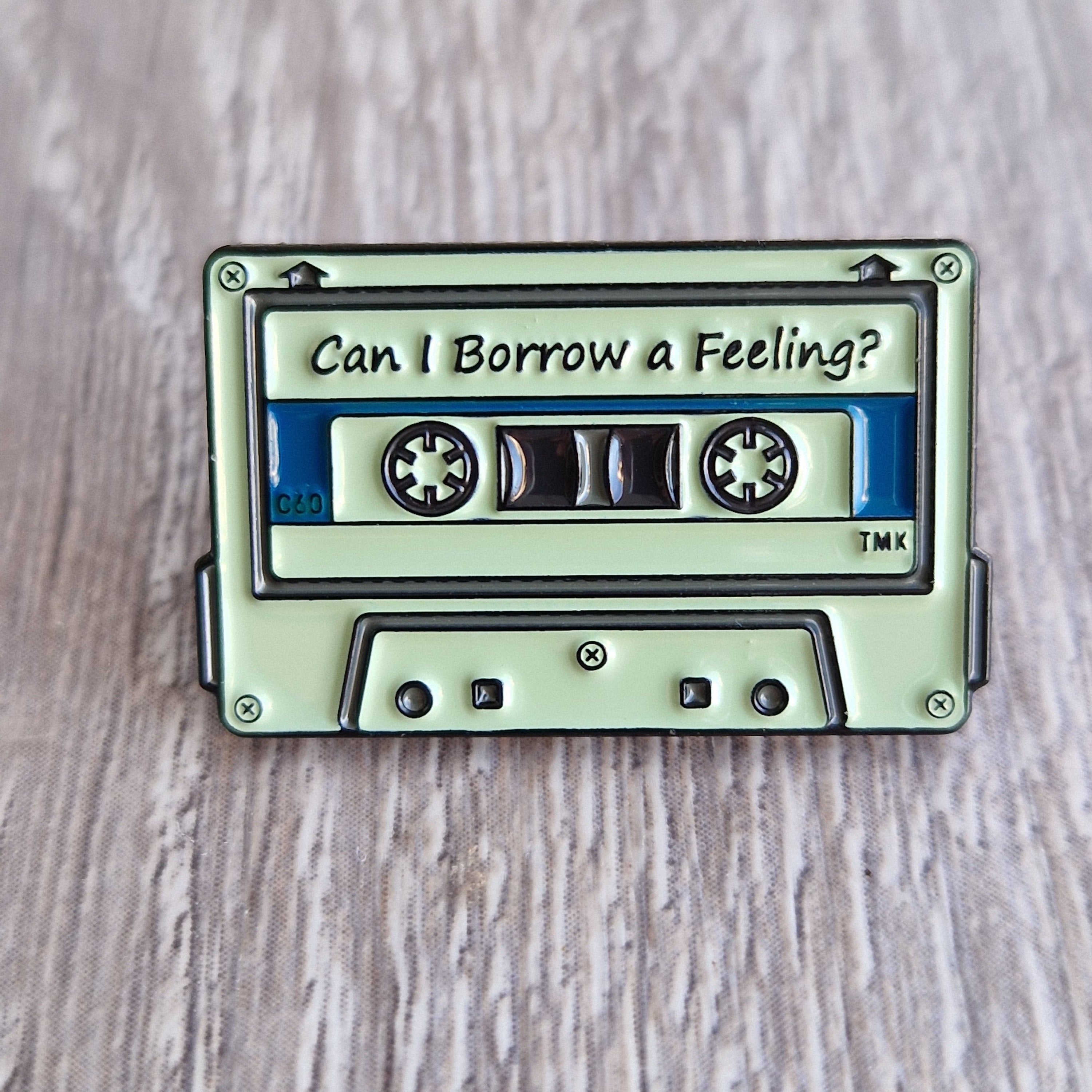 Spilla Audiocassetta “Can I Borrow a Feeling?”