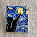 Spilla gatto sotto cielo stellato