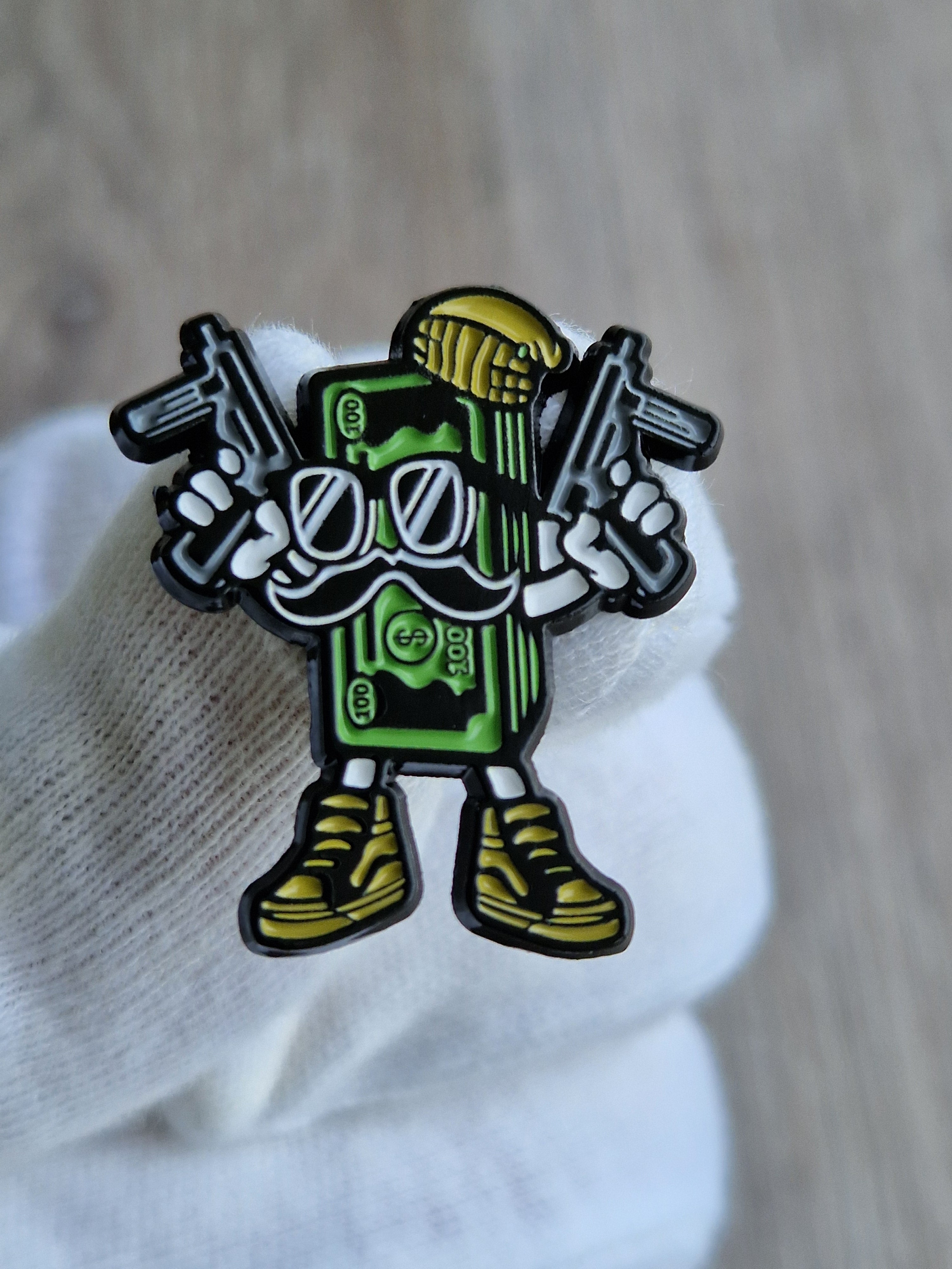 Spilla dollaro gangster