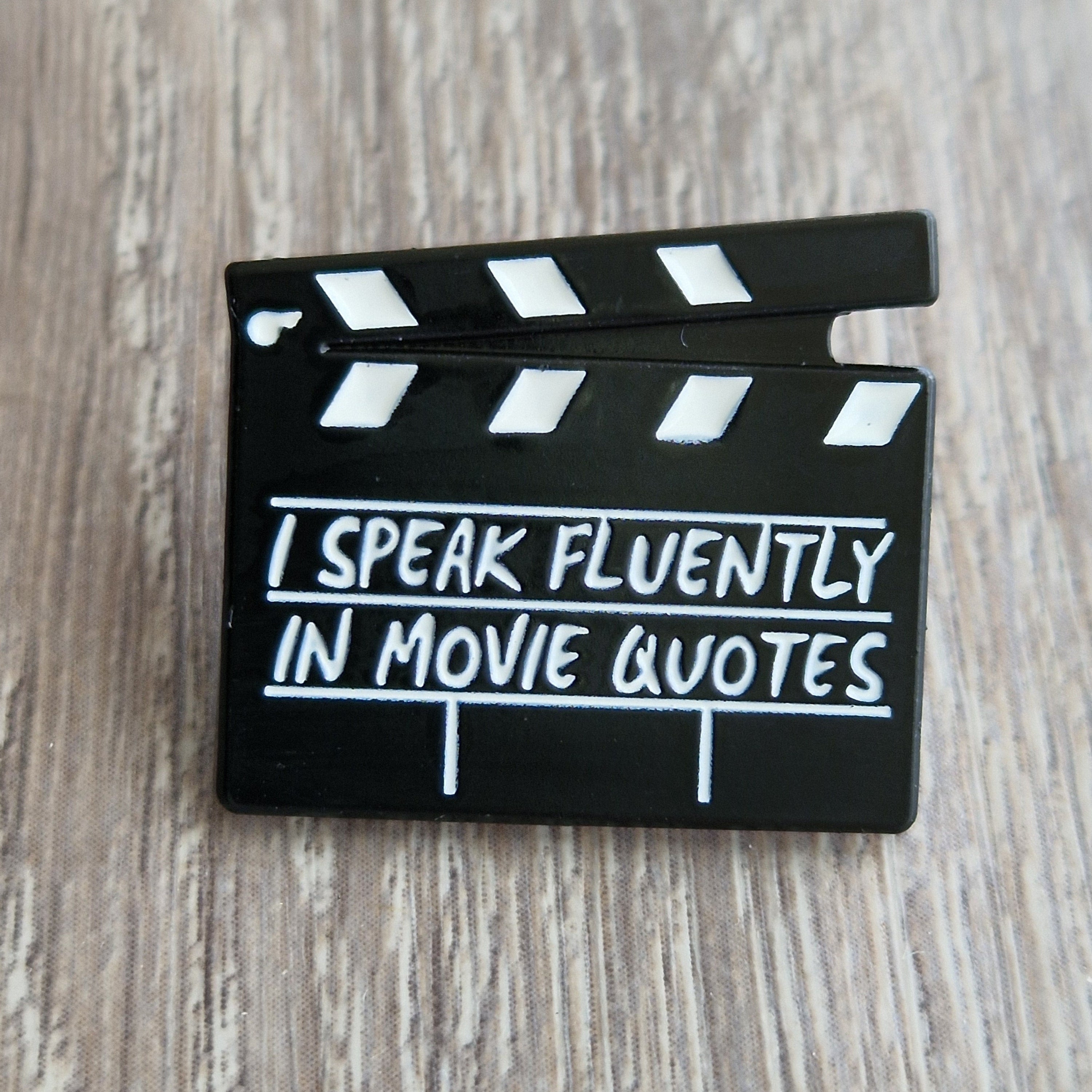 Spilla cinema “I speak fluently in movie quotes”