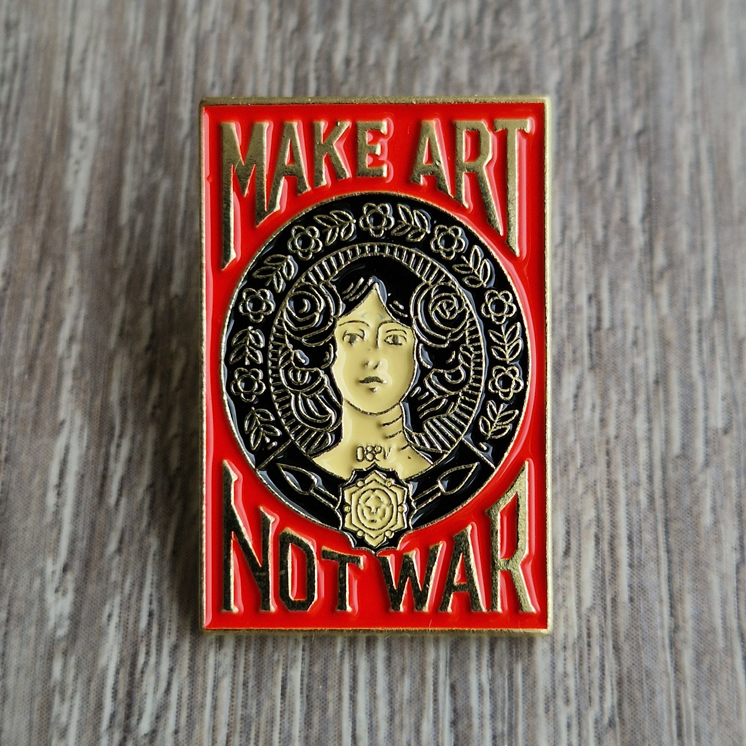 Spilla “Make Art Not War”
