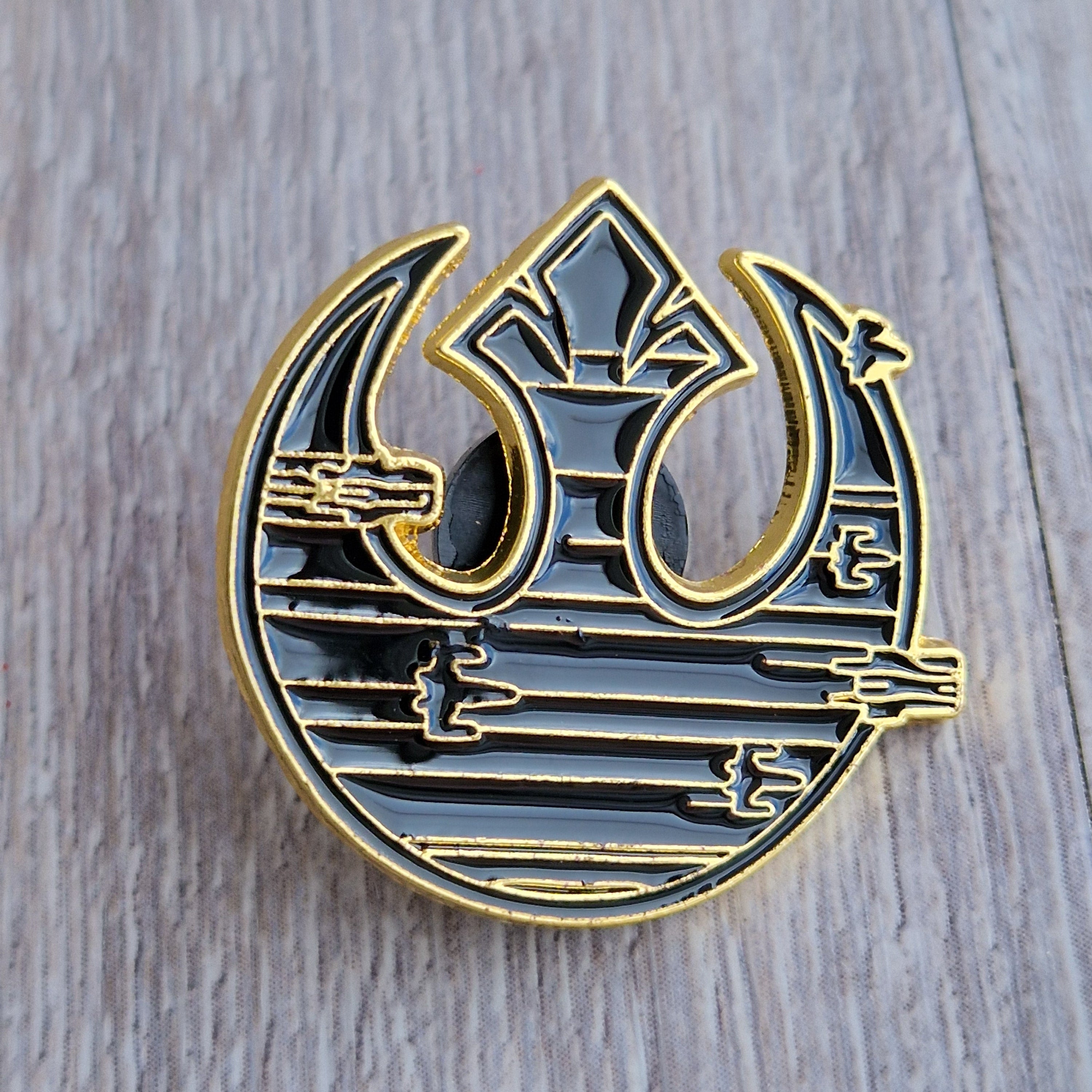 Spilla Ribelli Star Wars Nera e Oro