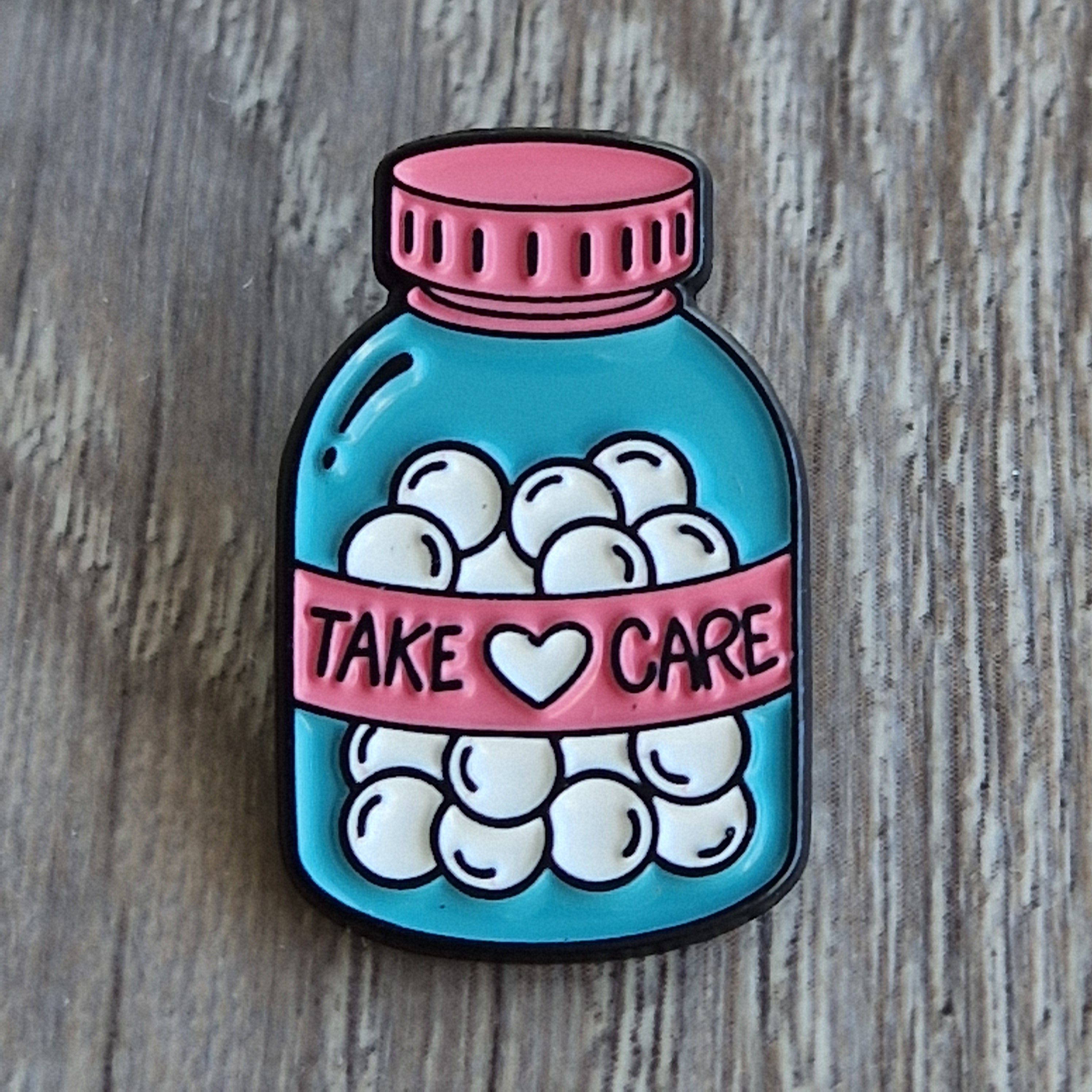 Spilla "Take Care