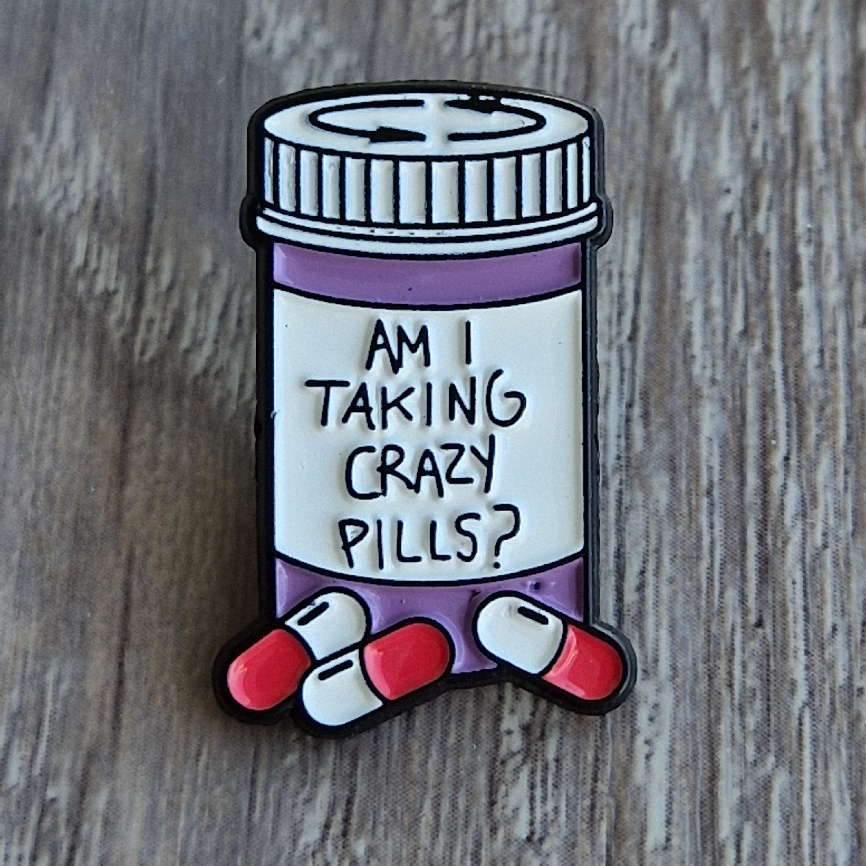 Spilla "Am I Taking Crazy Pills?